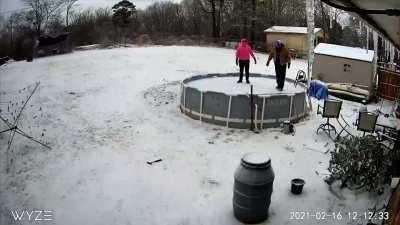 Standing on the frozen pool