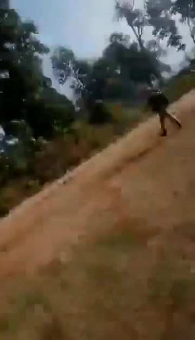 Kachin Independence Army (KIA) Fighter going Rambo with a Type 80 (Chinese PKM) LMG during a Combined Attack with People's Defense Force and Arakan Army rebels on a Myanmar Junta Army Base in Mabein, Shan State (January 20-21,2023) 