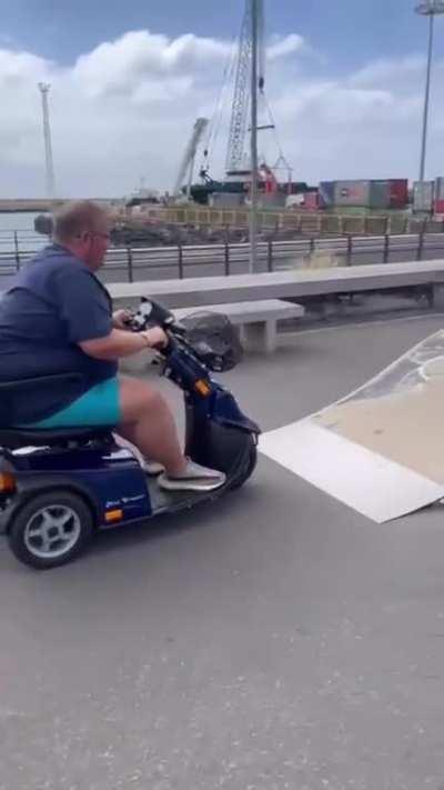 Jumping a ramp on a mobility scooter