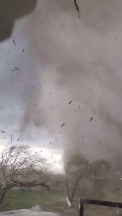 Train conductor and engineer survive a direct hit from a tornado