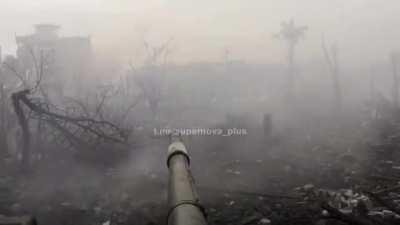 POV of a Russian tank in a town on the outskirts of Donetsk, really shows how destructive modern war is.