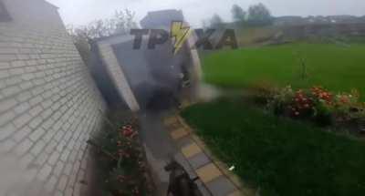 The Ukrainian soldier shot the Russian soldier hiding behind the door.