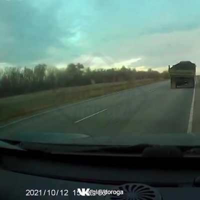 Toyota Corolla loses control and swerves into opposite lane. Driver of the hit car died. Three people were hospitalized.