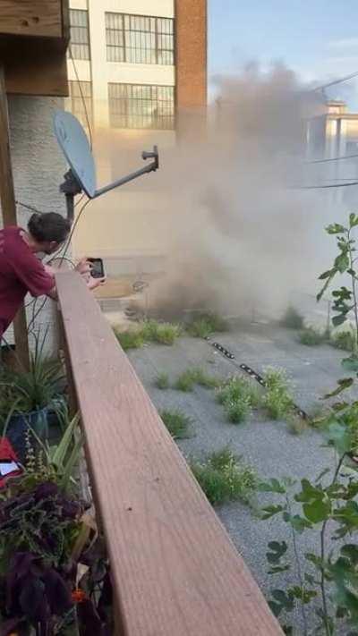 Caught the smoking truck that pulled over in front of my house blowing up. An inferno ensued.