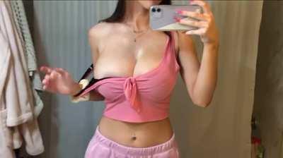 I don't know how she doesn't tip over with those on her chest