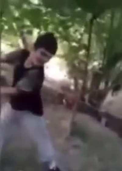 Kid playing with a bomb