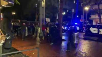 Protester receives atomic shove - Portland 23rd September