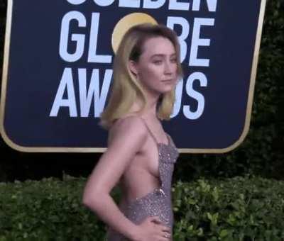 Saoirse Ronan flaunting her golden globes at the Golden Globes