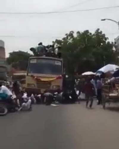 Sitting on top of a running bus