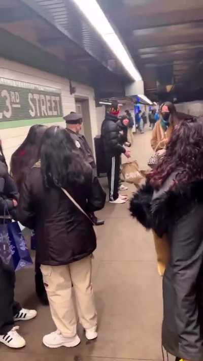 Hot dog abuse on the subway platform.