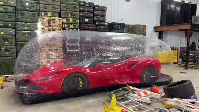 An inflatable, portable, thrown objects proof garage