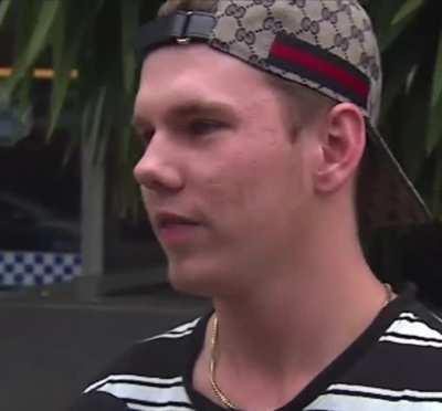 Australian man conducts interview with local news regarding an alleged robbery