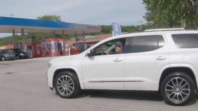 Man holds up a BLM sign in a racist American town, gets a ton of disgusting reactions