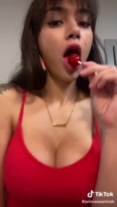 She is definitely imaging that lollipop to be something else