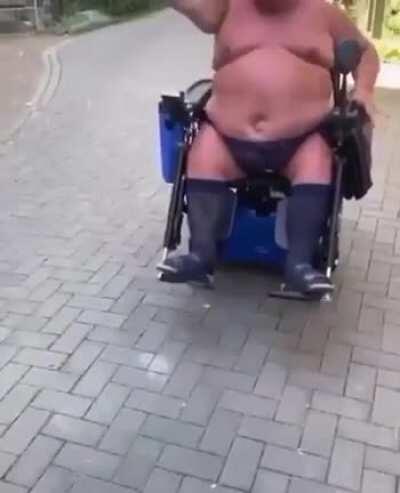 Angry wheelchair grandpa chasing off two guys in his undies (German freakout)