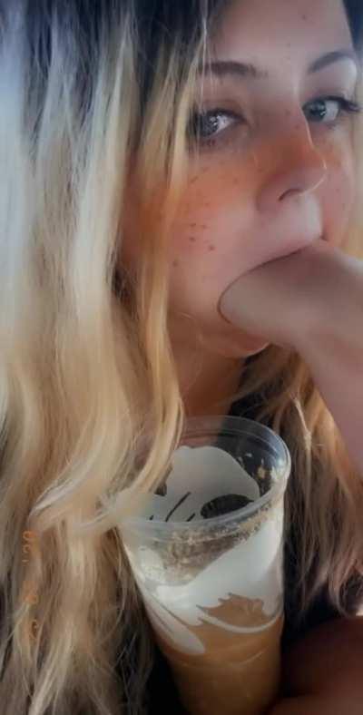 Cute girl fills up a cup in her car. One of my favourite videos.