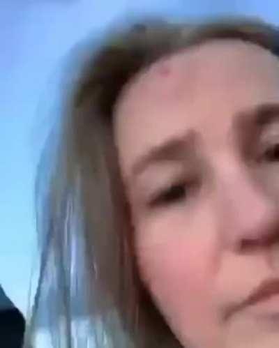 WCGW standing if front of a person golfing.