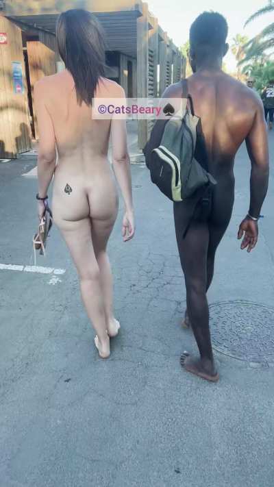 I proudly take a nude walk in the crowded streets with my black lover while Cucky follows us on the way for my public black African insemination. I'm not on birth control