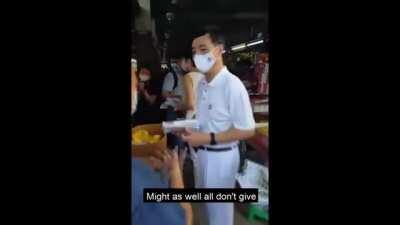 Uncle complaining to Jo Teo during walkabout