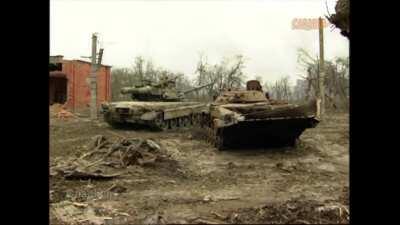 Destroyed Russian armor lines the roads in Grozny