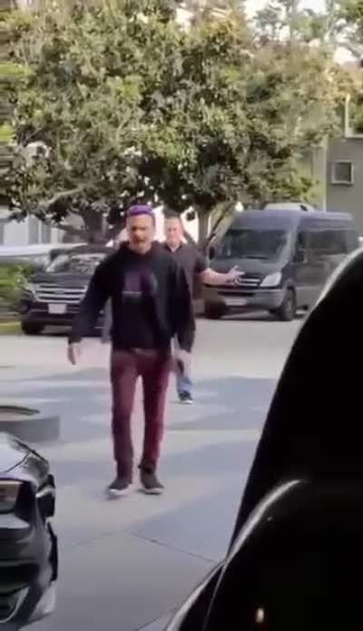 Unhinged little psycho tried to bait the big guy to hit him on film.