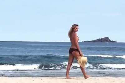 Margot walking Topless in just her panties on a beach