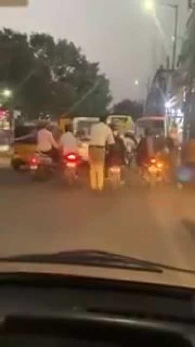 Hyderabad cop running for 2 km to help ambulance get through traffic