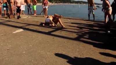 Bikini fight and a kick between her legs.