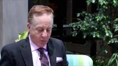 Marty Logan proving his mother died from Moderna jab