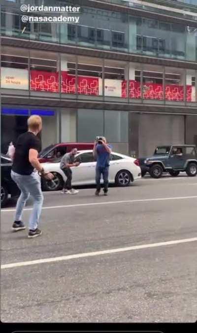 Idiots filming videos in the middle of a busy street in NYC