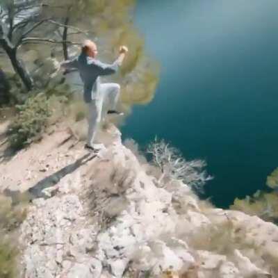 Running leap off a cliff.