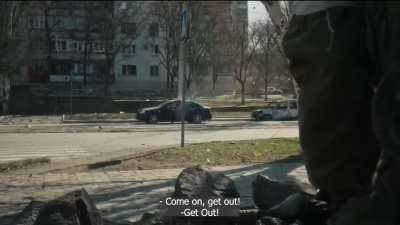 Civilian car drives into Russian crossfire during an Ukrainian ambush [Mariupol 16.03.2022]