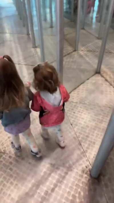 Kids + mirror maze =