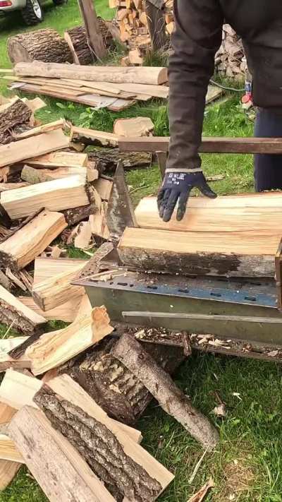 DIY loader and splitter handling firewood