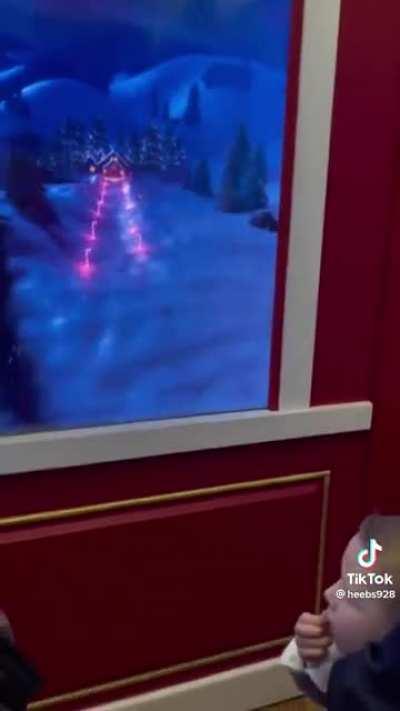 Kid's mind get blown riding Santa's Elevator Express