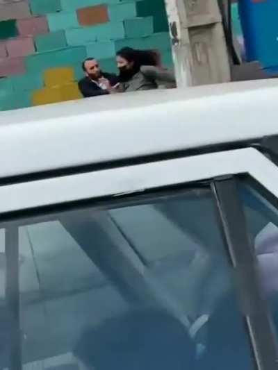 Iran: People trying to rescue a girl without Hijab from regime cops