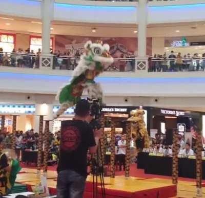 Dragon dance on poles