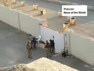 British soldiers brutally beating Iraqi children.