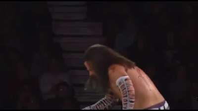 Jeff hardy‘s swanton bomb with thumbtacks in his back on Abyss sandwiched between two barbed wire tables