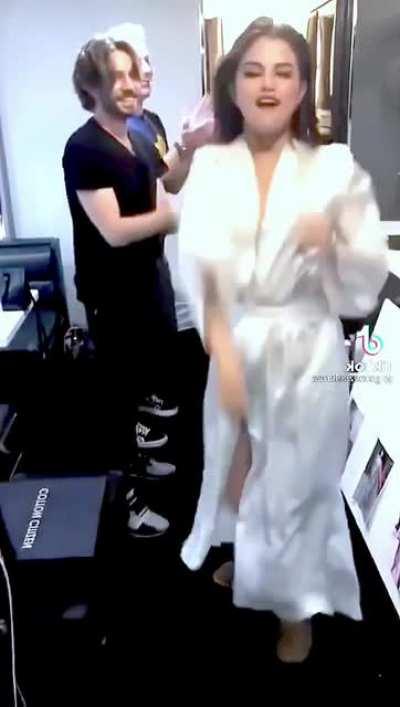 Squats w/slight panty peek..