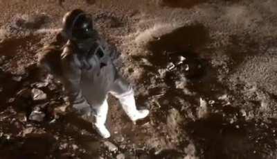 A man in India protesting for better roads..