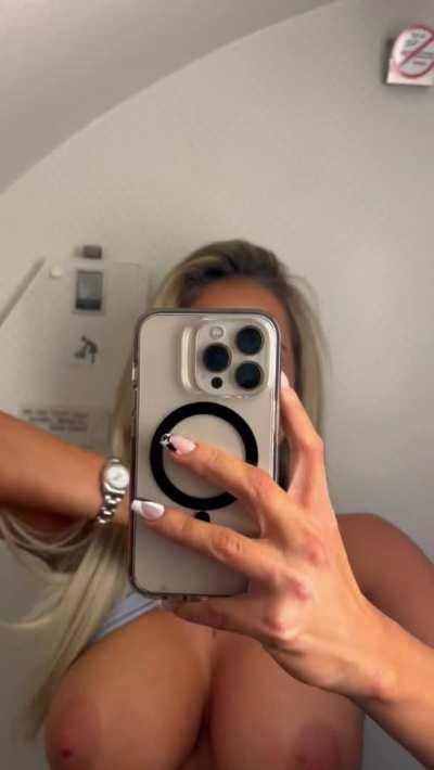 Some of the best tits you'll see flashing on a plane