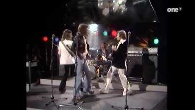 From 1975, the lead singer left this band to join another band and record one of the biggest albums of all time 5 years later with 50 million copies sold.