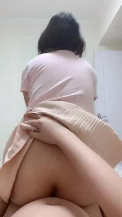 Riding him wearing a skirt