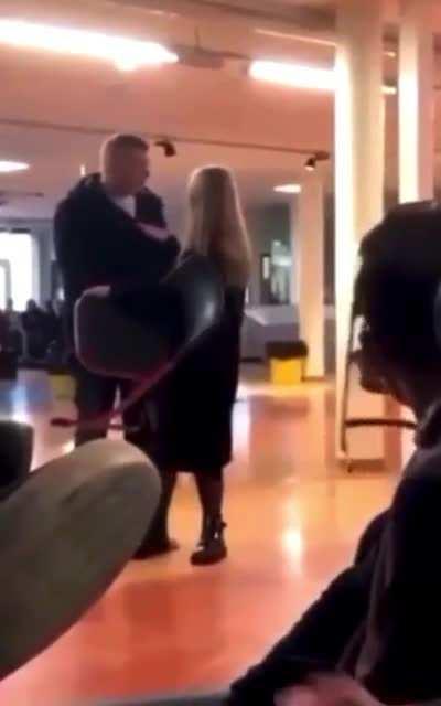 Girl takes boy's chair - until boy's larger friend intervenes.