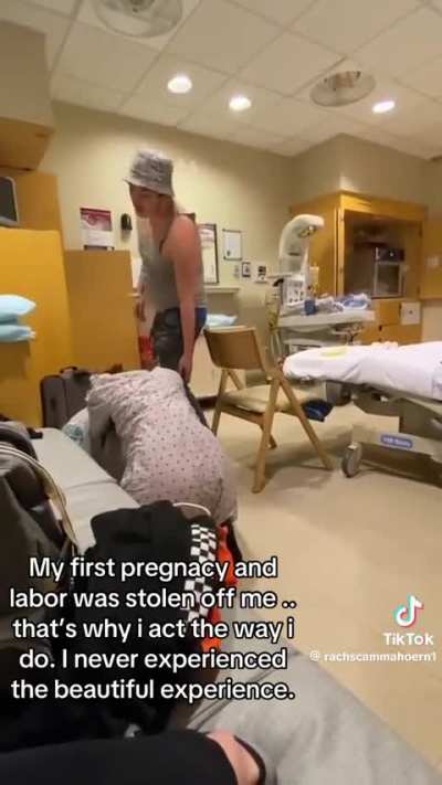 Imagine being in labor and the asshole that impregnated you acts like this.