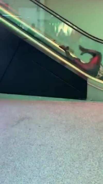 Going the wrong way on an esclator