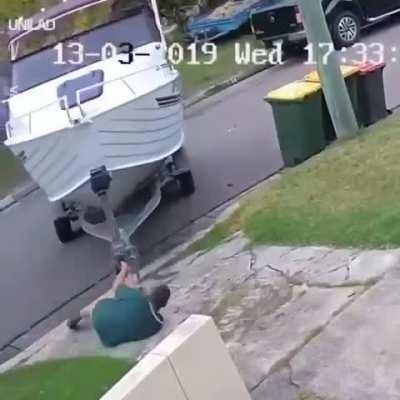 Man pulls his boat all the way to his truck