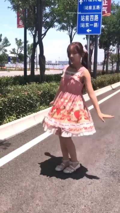 chinese girl dancing in public