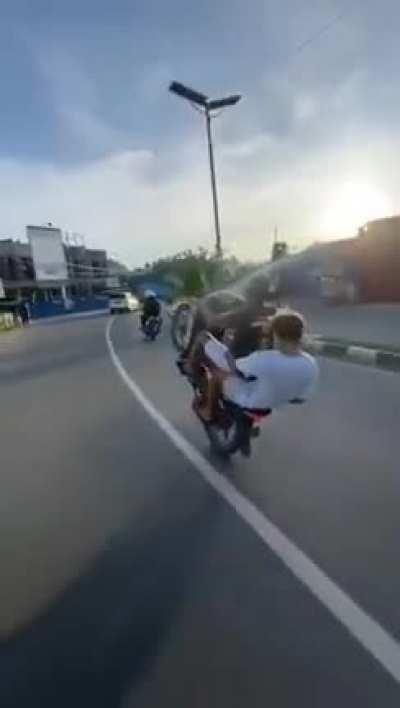 Atleast wear a fvcking helmet!